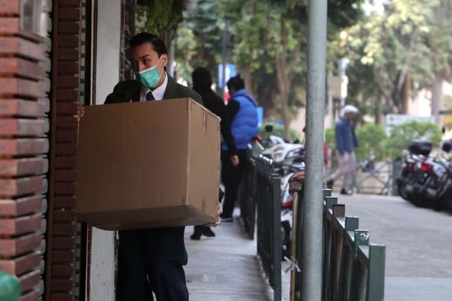 Front-line workers like delivery drivers need to be protected. Photo by Macau Photo Agency